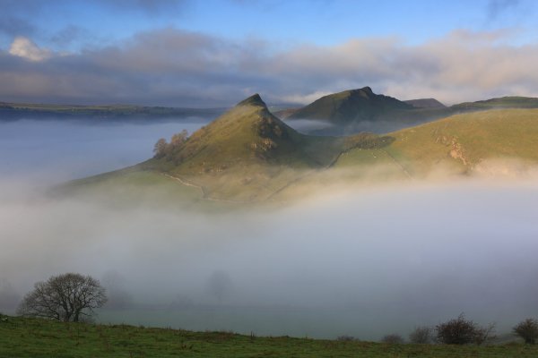 On a misty autumn morning I ventured onto Hitter Hill near Earl Sterndale in the Peak District.
I was greeted by a magnificent site as the iconic peaks of Chrome Hill and Parkhouse Hill emerged from the mist like castles in the sky.